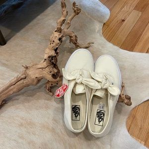 Vans slip on shoes. Pale yellow